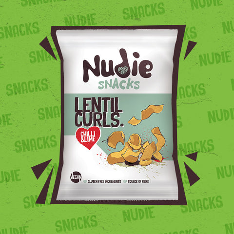 Nudie Snacks Chilli and Lime Lentil Curls Healthy Alternative to Crisps on a Green Background