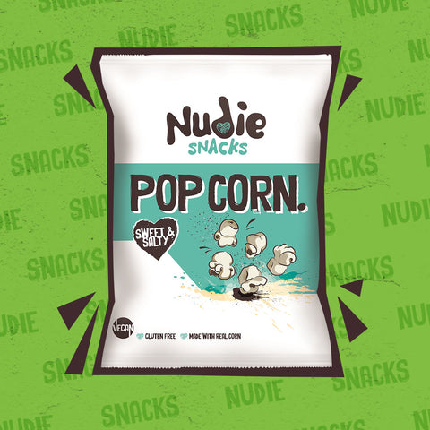 Nudie Snacks Sweet and Salty Popcorn on a Green Background 