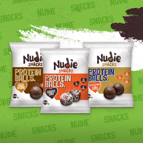 Nudie Snacks Plant-Based Protein Balls Collection on a green background. 