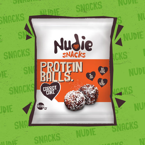Nudie Snacks Carrot Cake Plant Based Protein Balls Packet with a brown outline on a green background. 