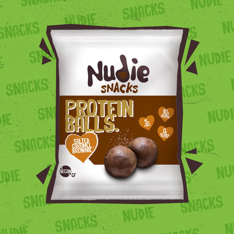 Nudie Snacks Salted Caramel Brownie Plant Based Protein Balls Product Packet With a brown outline on a green background. 
